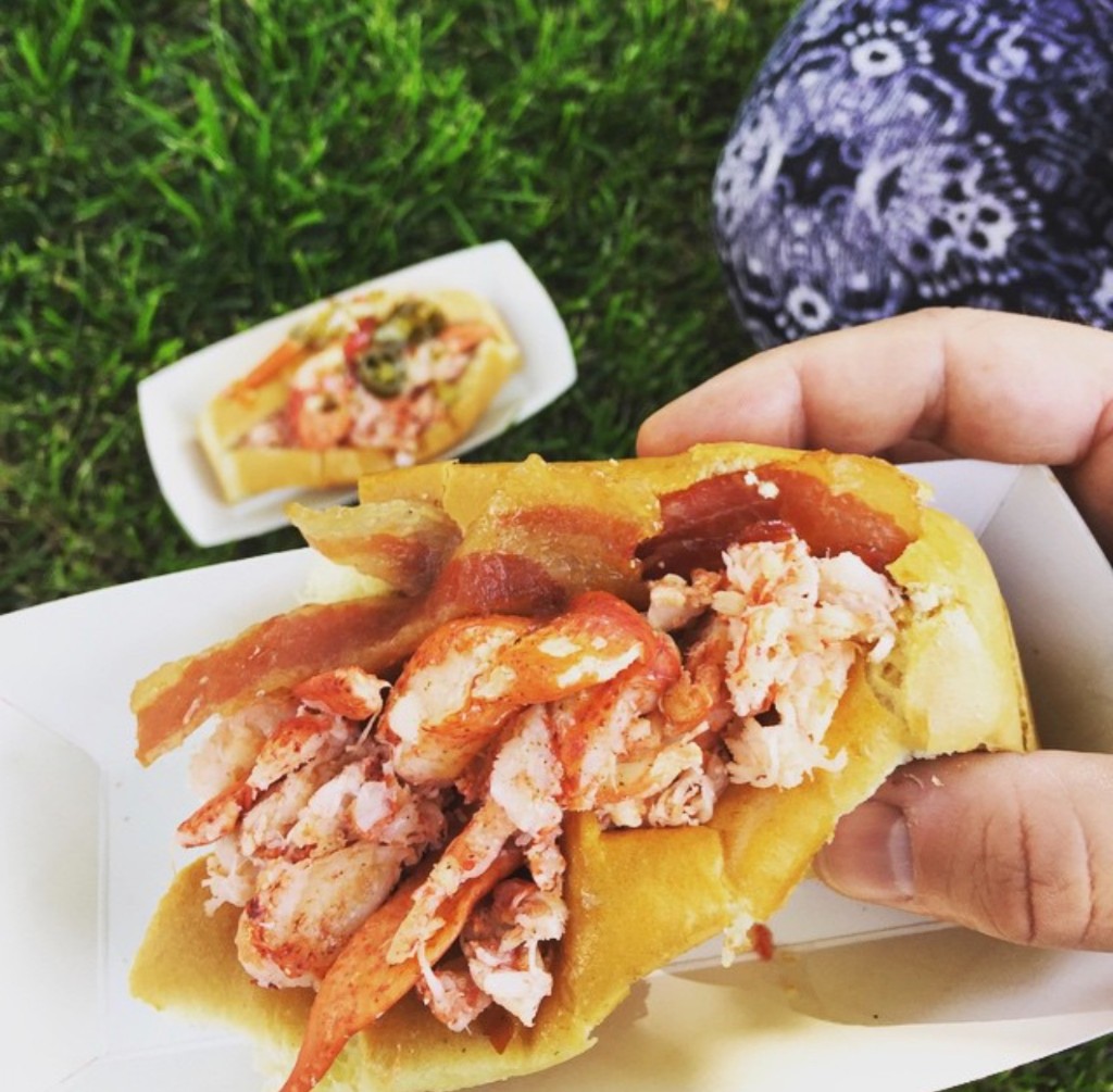 Guests under open sky along the vendor row at Chicago Food Truck Festival
