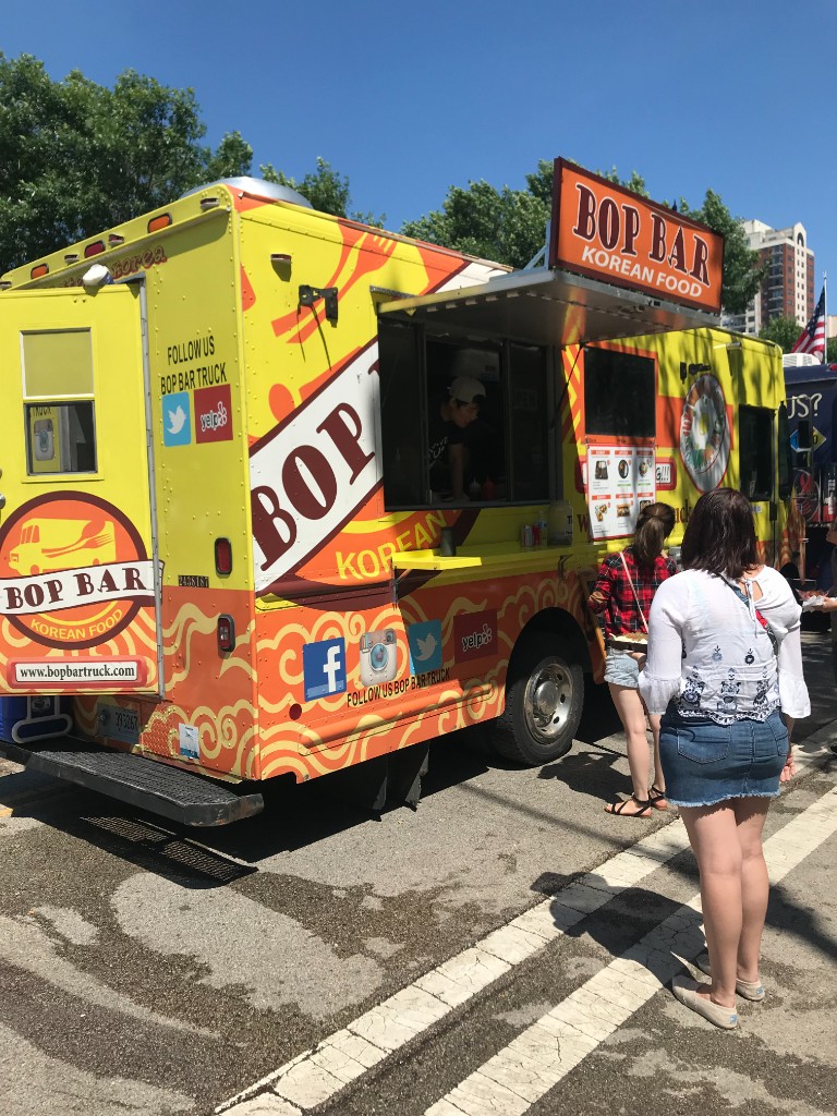 Busy street festival day in the South Loop with food vendors