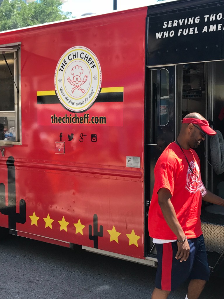 The Chi Cheff food truck with crew at the service window