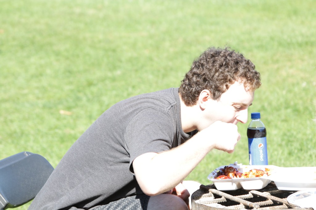 Crowd and activity on the festival field at the Labagh Woods Chicago Food Truck Festival.