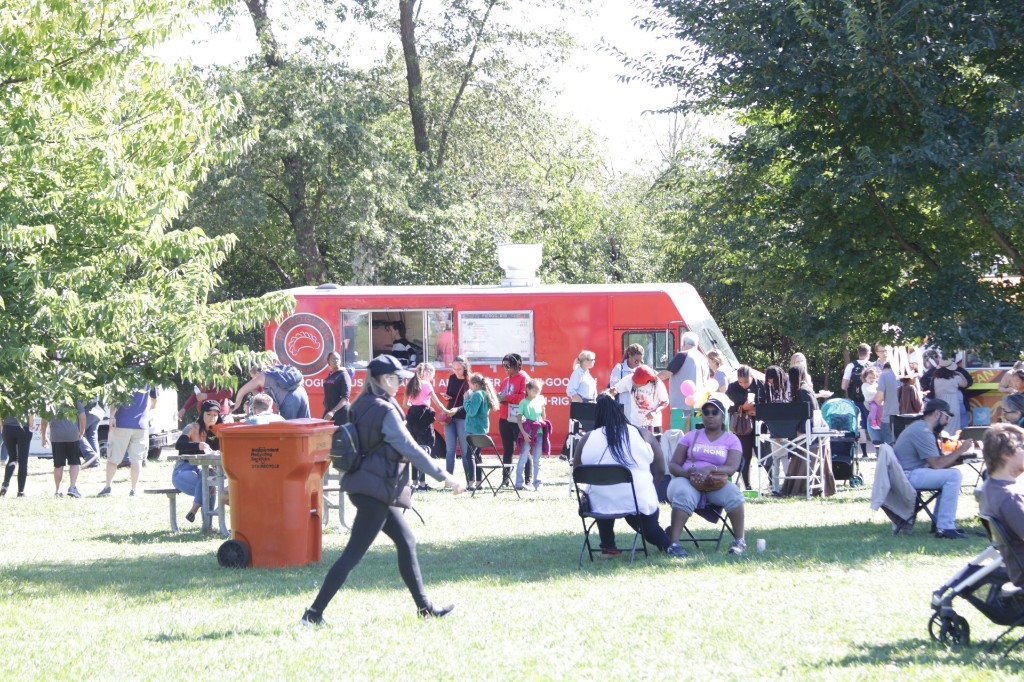 Community members enjoying the outdoor food festival at Labagh Woods.