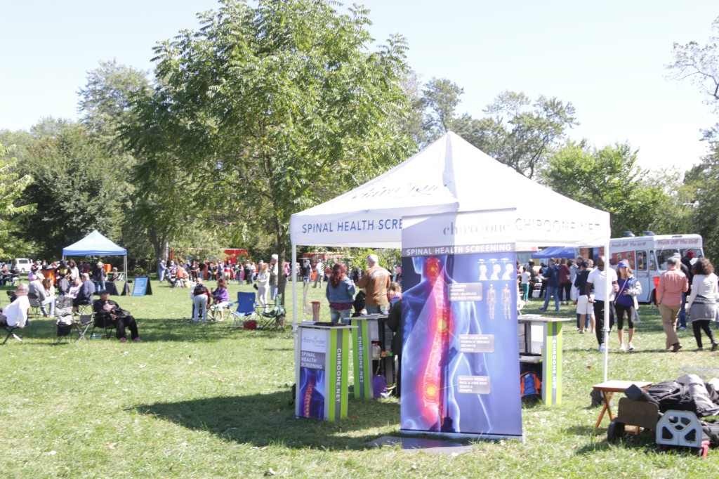 Outdoor food vendor scene with a canopy at Labagh Woods.