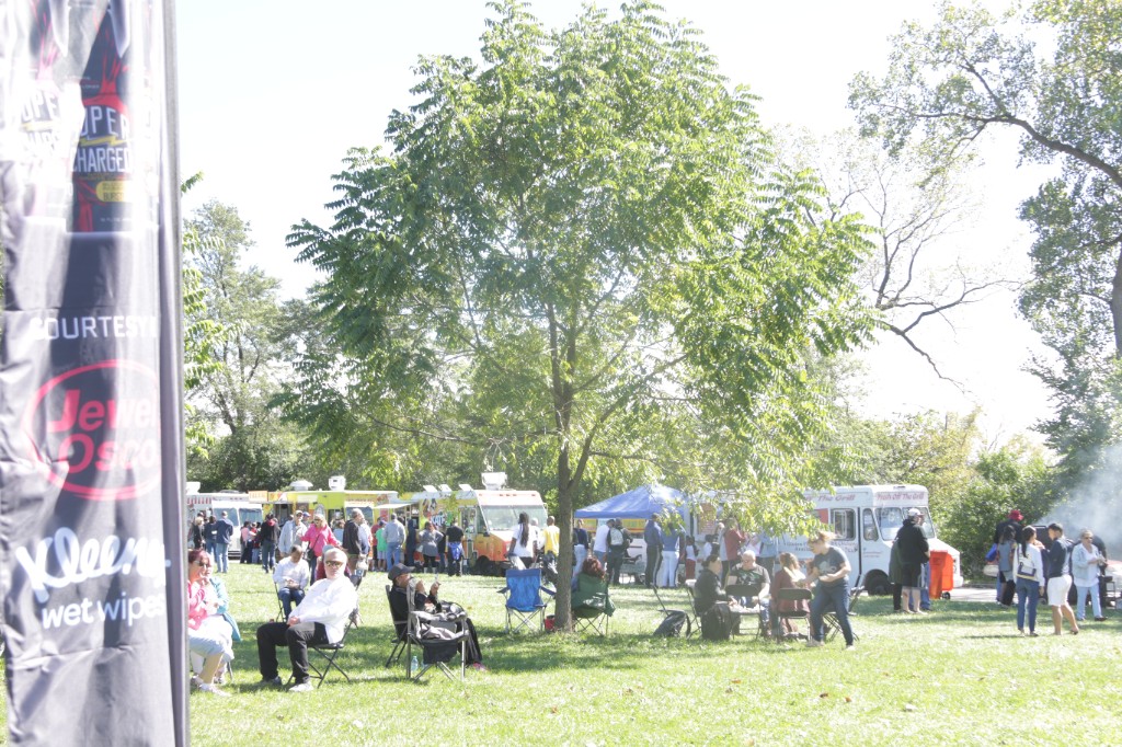 Picnic tables and gathering space on the lawn at Labagh Woods.
