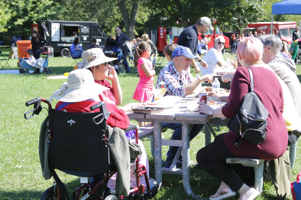 Families on the field at the Labagh Woods Fall Festival.