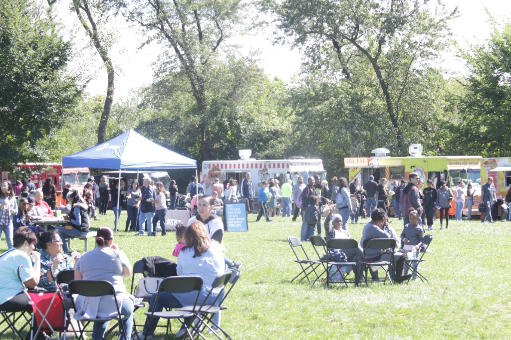 Another angle of food trucks and guests at Labagh Woods.