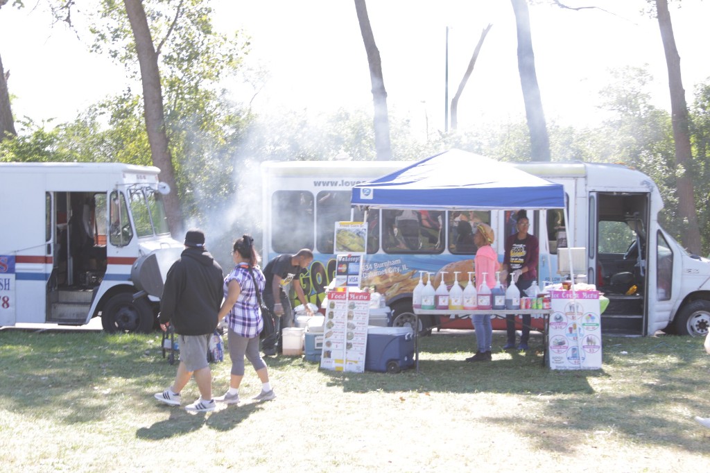Outdoor dining and socializing at the Labagh Woods Chicago Food Truck Festival.