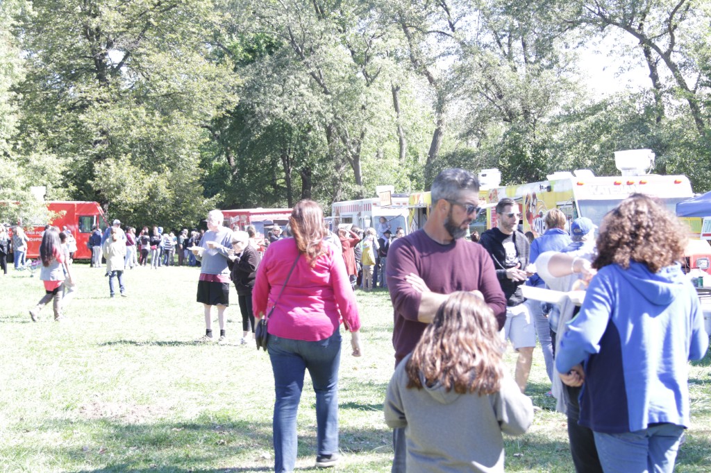 Guests and vendors on the grass at Labagh Woods.