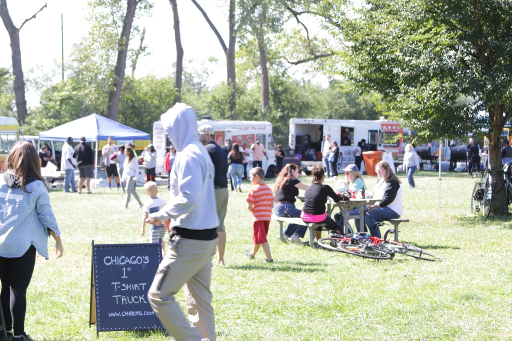 Vendor setup under bright sky at Labagh Woods.