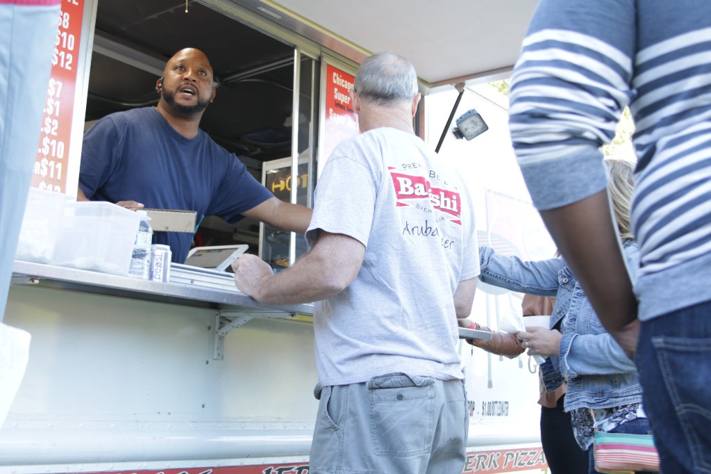 Face painting menu and colorful balloons at Labagh Woods.