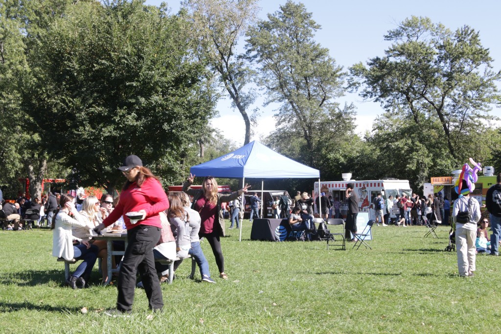 Community scene with trees and vendor lines at Labagh Woods.