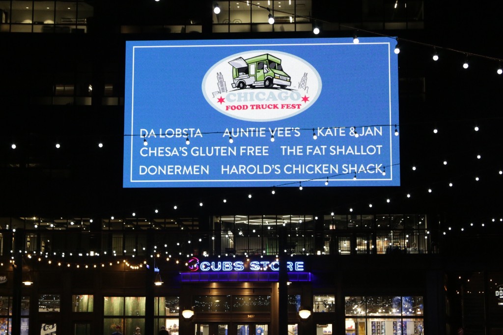 Milt's BBQ food truck beside Wrigley Field on a brick walkway