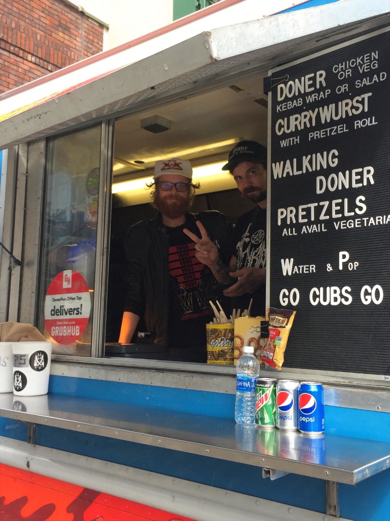 Kate & Jan Hotdogs truck with Cubs fans lined up outside Wrigley Field
