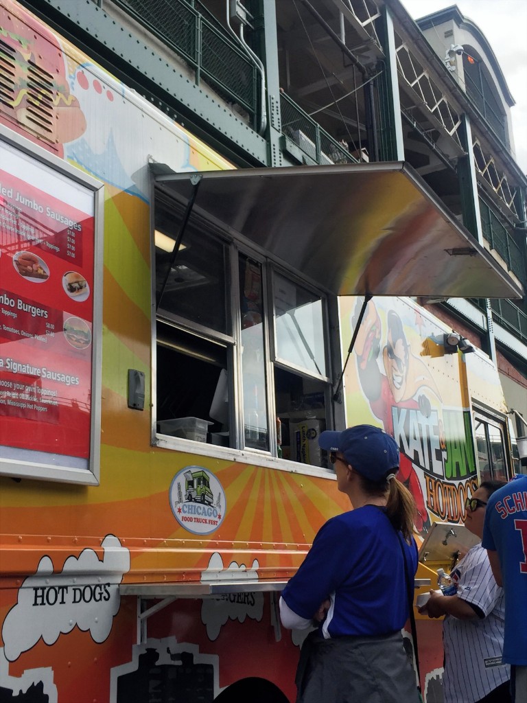 Food truck row and guests on Gallagher Way outside Wrigley Field