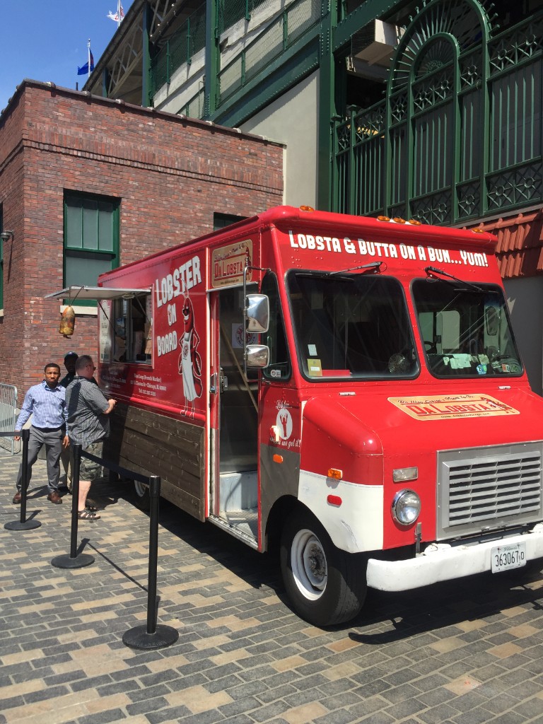 Da Lobsta food truck parked outside Wrigley Field on a sunny day