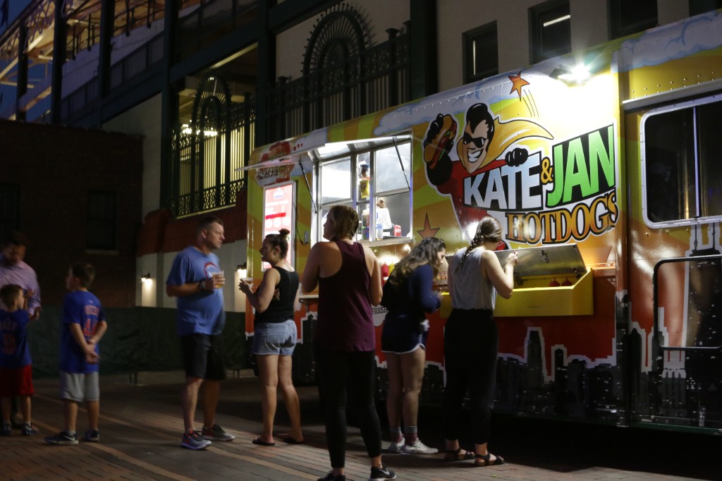 Kate & Jan Hotdogs truck at night outside Wrigley Field