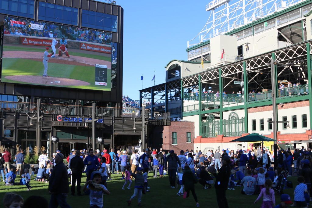 Kate & Jan Hotdogs truck and fans lined up outside Wrigley Field
