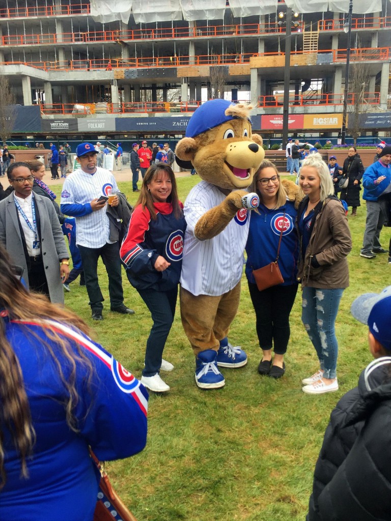 Clark the Cub mascot posing with fans on Gallagher Way