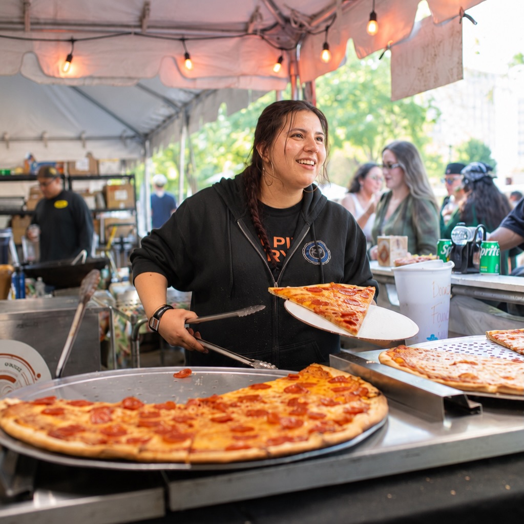 Bacci Pizza — giant pepperoni jumbo slices served fresh at the festival